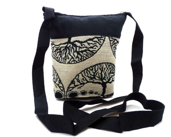 Medium-sized cushioned square-shaped purse bag with tree of life print pattern and coconut button and beads in beige and black color combination.