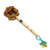 Handmade bamboo wooden stick rattle shaker music instrument with cacho seed pods and a cotton strap on handle.