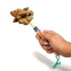 Handmade bamboo wooden stick rattle shaker music instrument with cacho seed pods and a cotton strap on handle.
