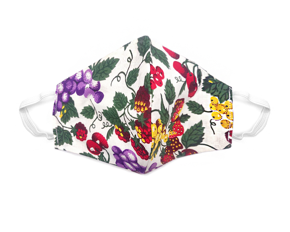 Handmade fruit medley print fabric face mask with 100% cotton and elastic straps in white and multicolored kid/teen size.
