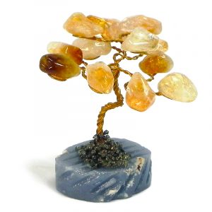 Handmade golden-colored metal wire and tumbled yellow citrine gemstone crystal tree of life table ornament with crushed pyrite and a round stone base.