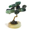 Handmade golden-colored metal wire and tumbled green aventurine gemstone crystal tree of life table ornament with crushed pyrite and a round stone base.