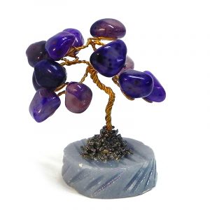 Handmade golden-colored metal wire and tumbled purple agate gemstone crystal tree of life table ornament with crushed pyrite and a round stone base.