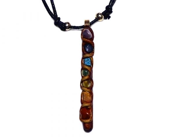 Natural wooden stick pendant with resin and 7 chakra rainbow-colored tumbled gemstone crystals on adjustable necklace.