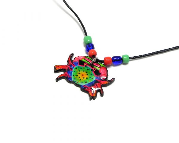 Handmade tropical crab acrylic pendant with seed beads on black necklace in red, blue, green, and yellow color combination.