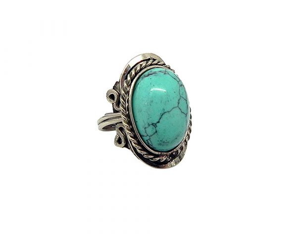 Handmade oval-shaped semi-precious gemstone cabochon on alpaca silver metal ring with rope edge border in turquoise howlite.
