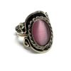 Handmade small oval-shaped cat's eye glass bead cabochon on adjustable alpaca silver metal ring with rope edge border in pink color.
