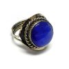 Handmade small round-shaped cat's eye glass bead cabochon on adjustable alpaca silver metal ring with rope edge border in blue color.