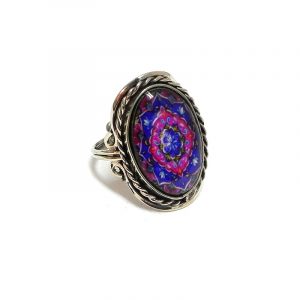 Handmade oval-shaped acrylic New Age themed mandala graphic design on alpaca silver metal ring with rope edge border in indigo, hot pink, yellow, and white color combination.