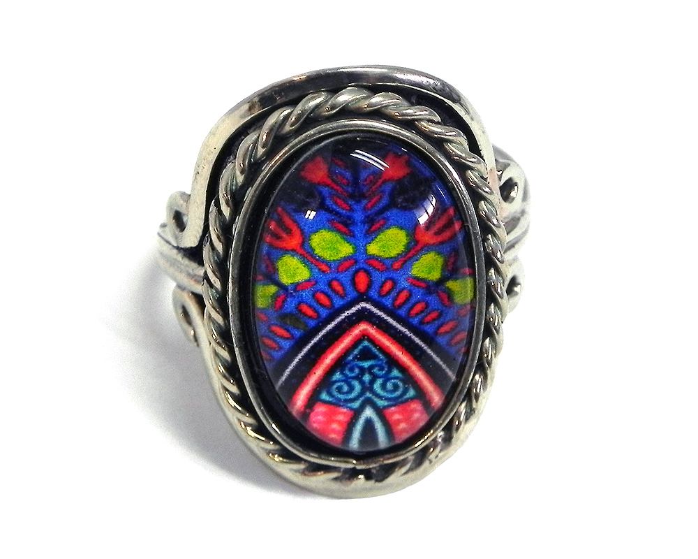 RG-050111050134 Handmade small oval-shaped acrylic New Age themed pattern graphic design on alpaca silver metal ring with rope edge border in blue, red, blue, lime green, turquoise, and navy color combination.