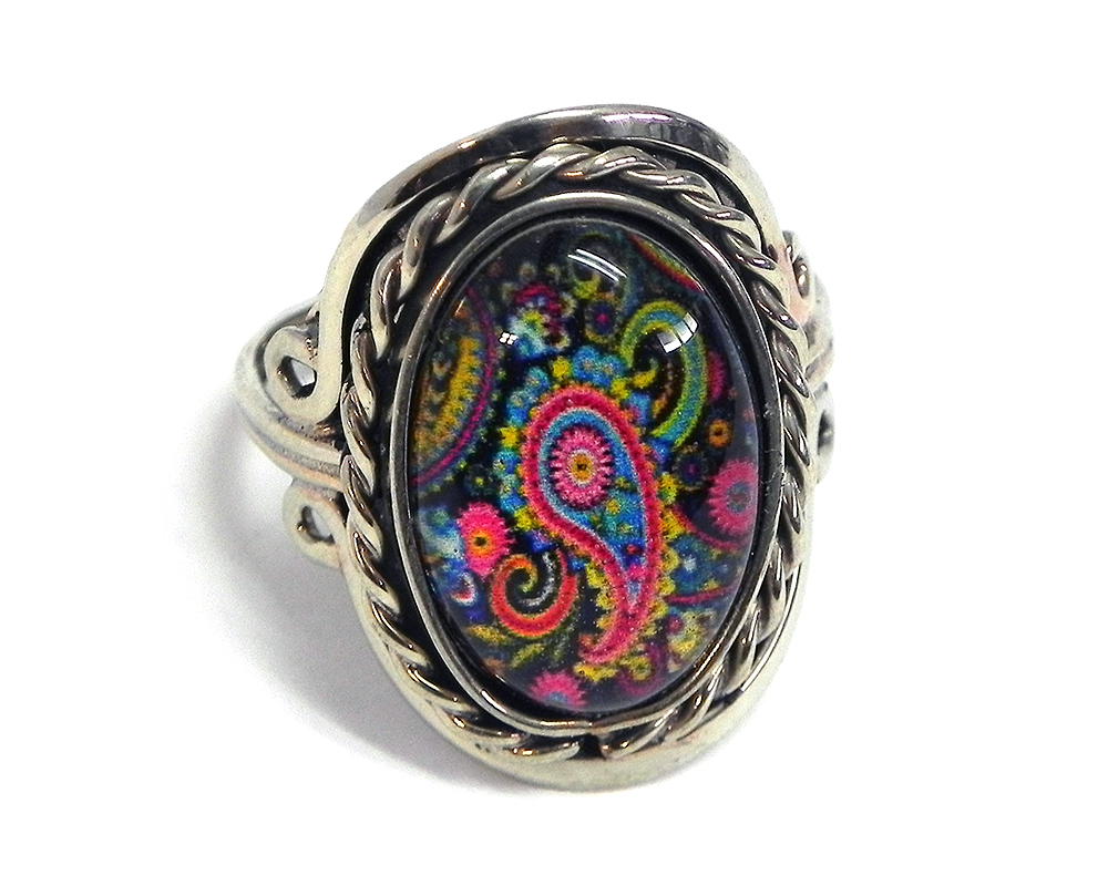 RG-050109990937 Handmade small oval-shaped acrylic New Age themed paisley graphic design on alpaca silver metal ring with rope edge border in black and multicolored color combination.
