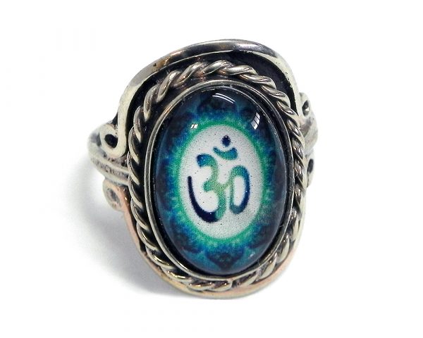 Handmade small oval-shaped acrylic New Age themed floral om sign graphic design on alpaca silver metal ring with rope edge border in teal green, green, and white color combination.