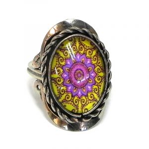 Handmade small oval-shaped acrylic New Age themed psychedelic floral mandala graphic design on alpaca silver metal ring with rope edge border in yellow, pink, magenta, and burgundy color combination.