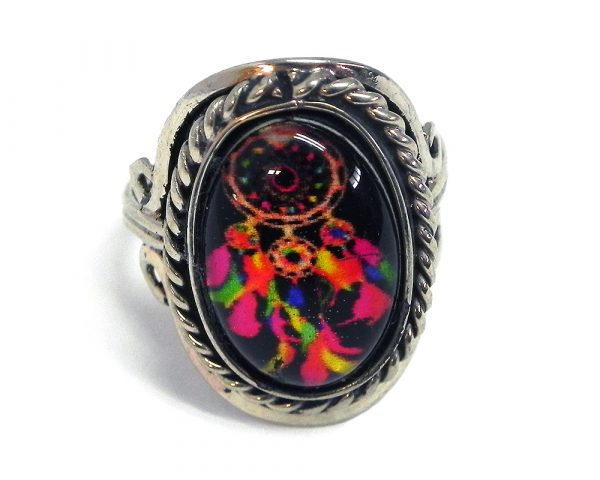 Handmade small oval-shaped acrylic Southwest themed dream catcher graphic design on alpaca silver metal ring with rope edge border in black and multicolored color combination.