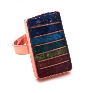Rectangle-shaped acrylic resin, copper wire, and crushed chip stone inlay orgonite cabochon with 7 chakra rainbow striped pattern on adjustable copper metal ring.