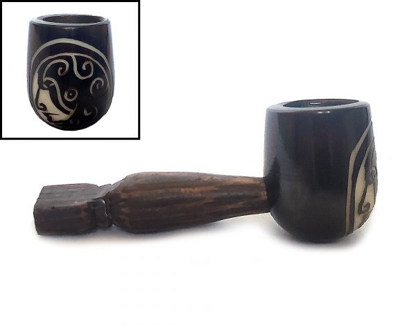 Handcarved tobacco smoking natural tagua nut hand pipe of a Native American Indian head profile in small size.