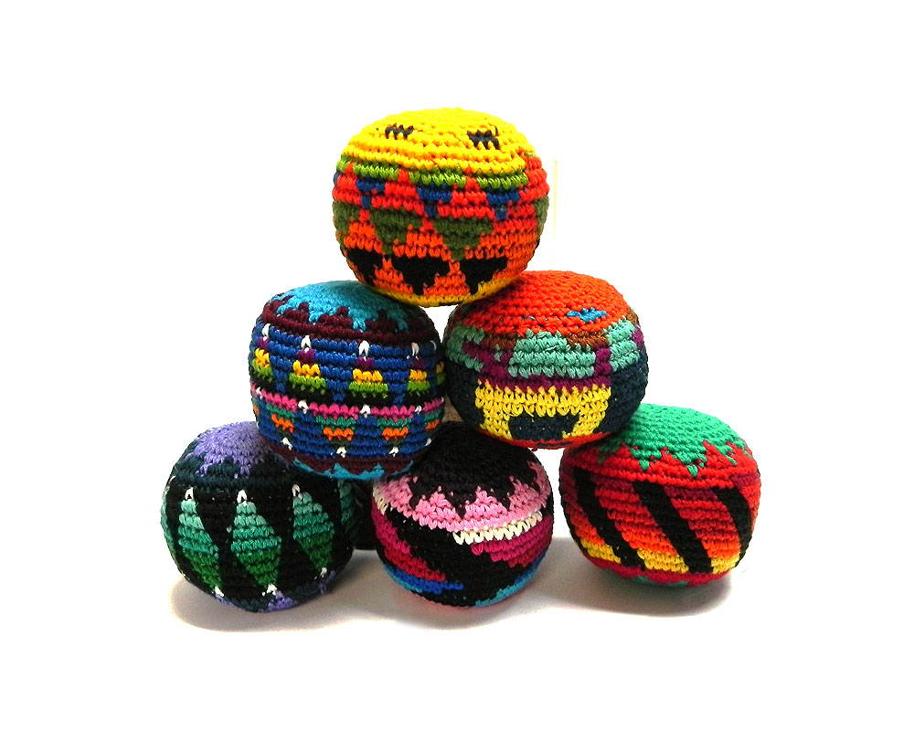 Handmade assorted multicolored hacky balls with geometric tribal pattern design.