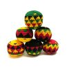 Handmade assorted multicolored hacky balls with geometric tribal pattern design in Rasta colors.