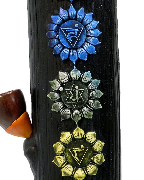 Handcrafted tobacco smoking water pipe of seven chakra aligned symbols with purple lotus flower base.