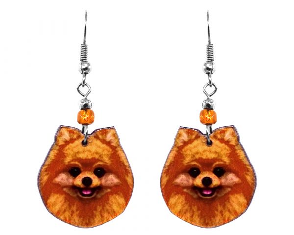 Mia Jewel Shop: Pomeranian dog face acrylic dangle earrings with beaded metal hooks in orange, tan, and black color combination.