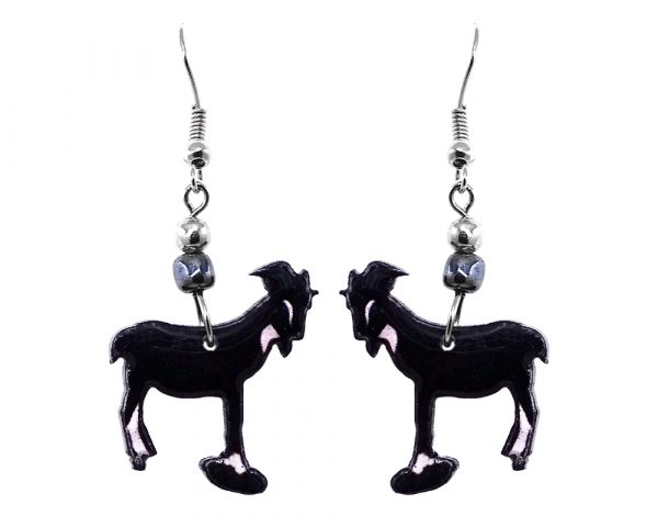 Goat acrylic dangle earrings with beaded metal hook in black and white color combination.
