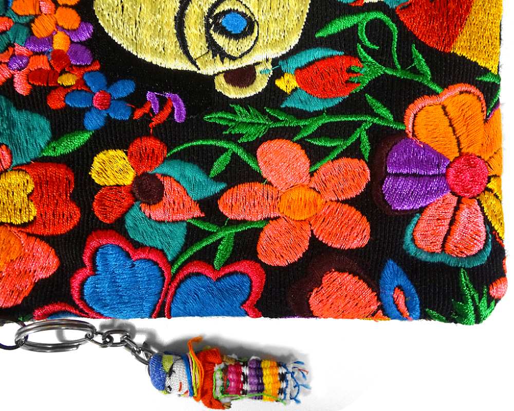 Medium-sized slim rectangular brown vegan leather purse bag with cotton embroidered Frida Kahlo cartoon doll and floral designs in black and multicolored color combination.