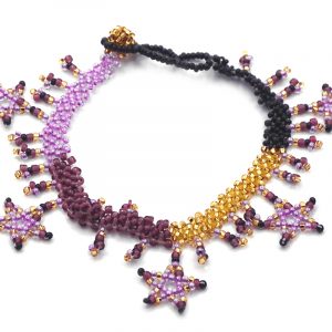 Handmade Czech glass seed bead anklet with beaded stars and fringe dangles in purple, lavender, gold, and black color combination.