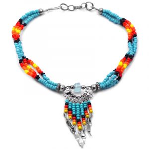 Handmade Native American inspired seed bead multi strand anklet with chip stone and beaded dangles in turquoise blue, black, red, orange, and yellow color combination.