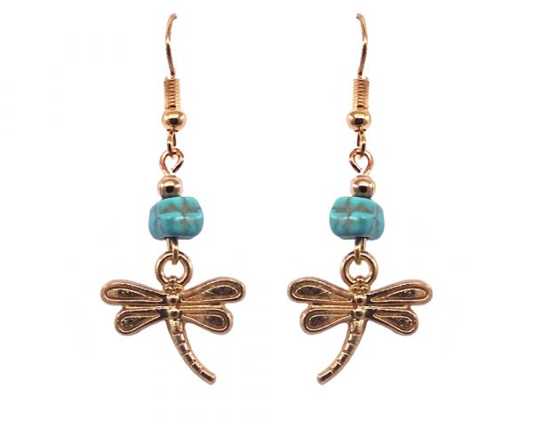 Handmade gold-colored dragonfly charm dangle earrings with turquoise howlite chip stone.