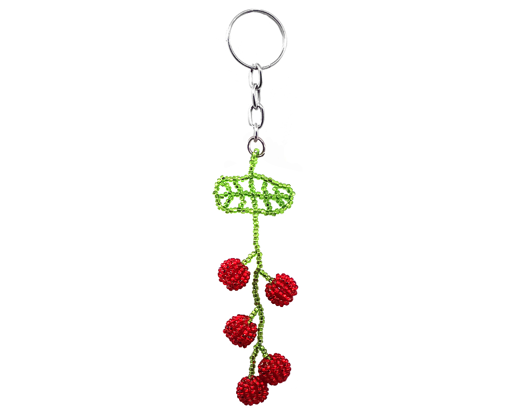 Handmade Czech glass seed bead figurine keychain of cherries on a leaf in red and lime green color combination.