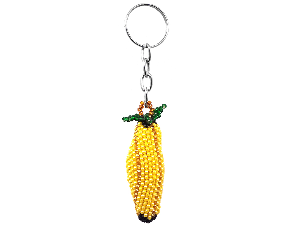 Handmade Czech glass seed bead figurine keychain of banana in yellow and green color combination.