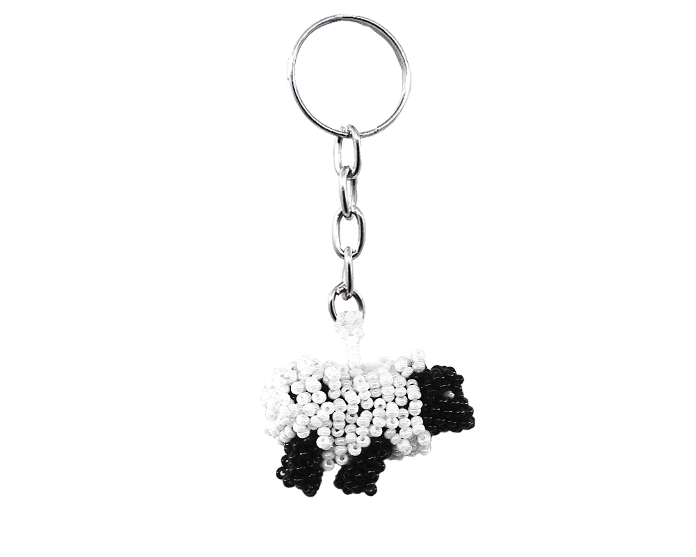 Handmade Czech glass seed bead figurine keychain of a sheep in white and black color combination.