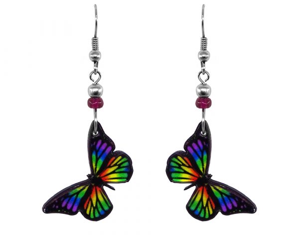 Handmade monarch butterfly earrings with acrylic, seed beads, and metal hooks in black and rainbow color combination.