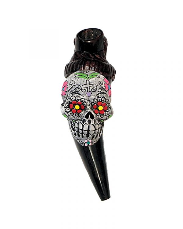 Handcrafted tobacco smoking natural bullhorn hand pipe of a white Day of the Dead sugar skull with multicolored floral designs.