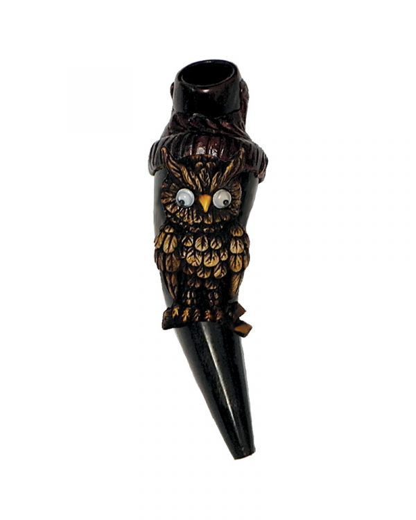 Handcrafted tobacco smoking natural bullhorn hand pipe of a perched brown owl with googly eyes on a branch.