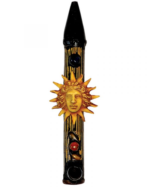 Handcrafted tobacco smoking natural bamboo wooden peace pipe of a golden yellow face with sun rays.