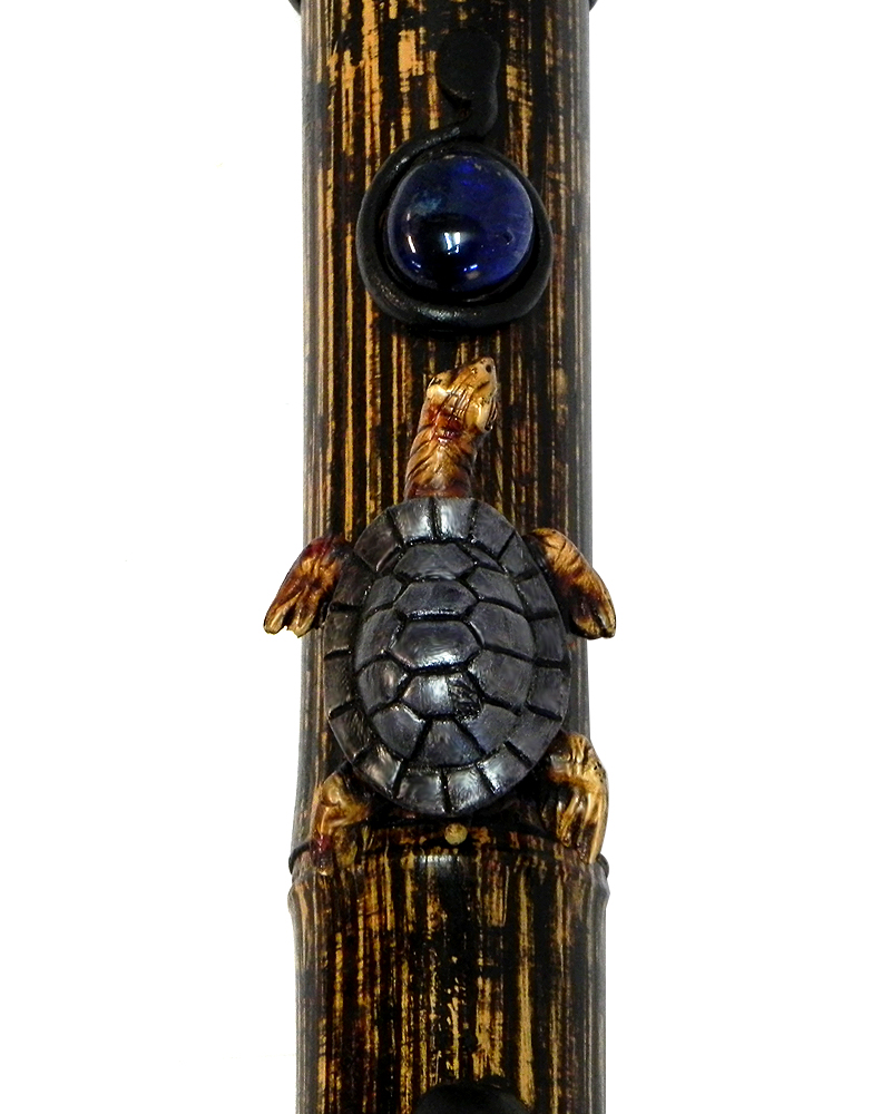 Handcrafted tobacco smoking natural bamboo wooden peace pipe of a sea turtle.
