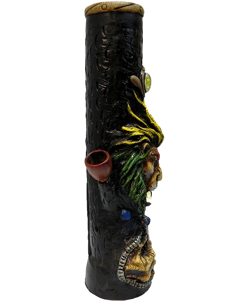 Handcrafted tobacco smoking water pipe of a smoking lion head with a scar on one eye, Rasta-colored mane, and green and gold peace sign necklace.