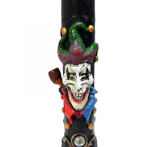 Handcrafted tobacco smoking water pipe of an evil mad jester head with a creepy smile and a red, blue, and green suit.