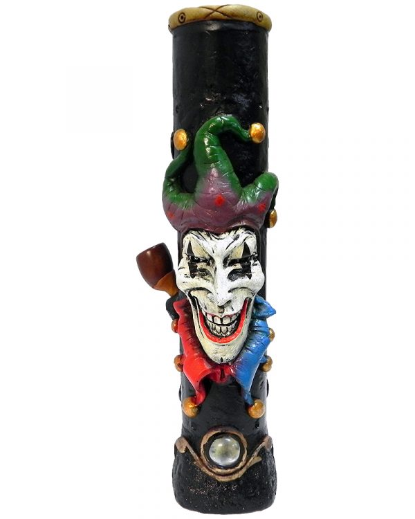 Handcrafted tobacco smoking water pipe of an evil mad jester head with a creepy smile and a red, blue, and green suit.