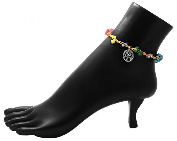 Handmade tied string pull tie anklet with rainbow colored chip stones, seed beads, and dangling silver metal tree of life charm in beige color.
