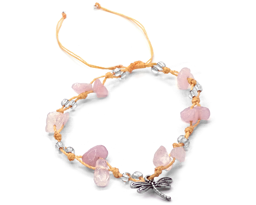 Handmade tied string pull tie anklet with chip stones, seed beads, and dangling silver metal dragonfly charm in light pink rose quartz, clear, and beige color combination.