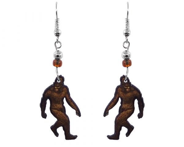 Handmade Bigfoot acrylic dangle earrings with beaded metal hooks in brown, tan, and black color combination.