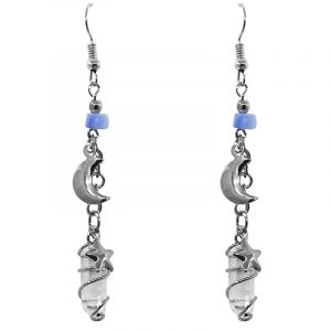 Handmade silver metal wire wrapped clear quartz crystal earrings with chip stone and crescent moon and stars charm dangles in light blue.
