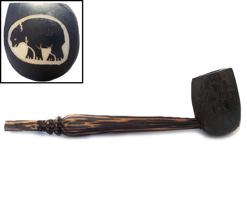 Handcarved tobacco smoking natural tagua nut hand pipe of a big bear in large size.
