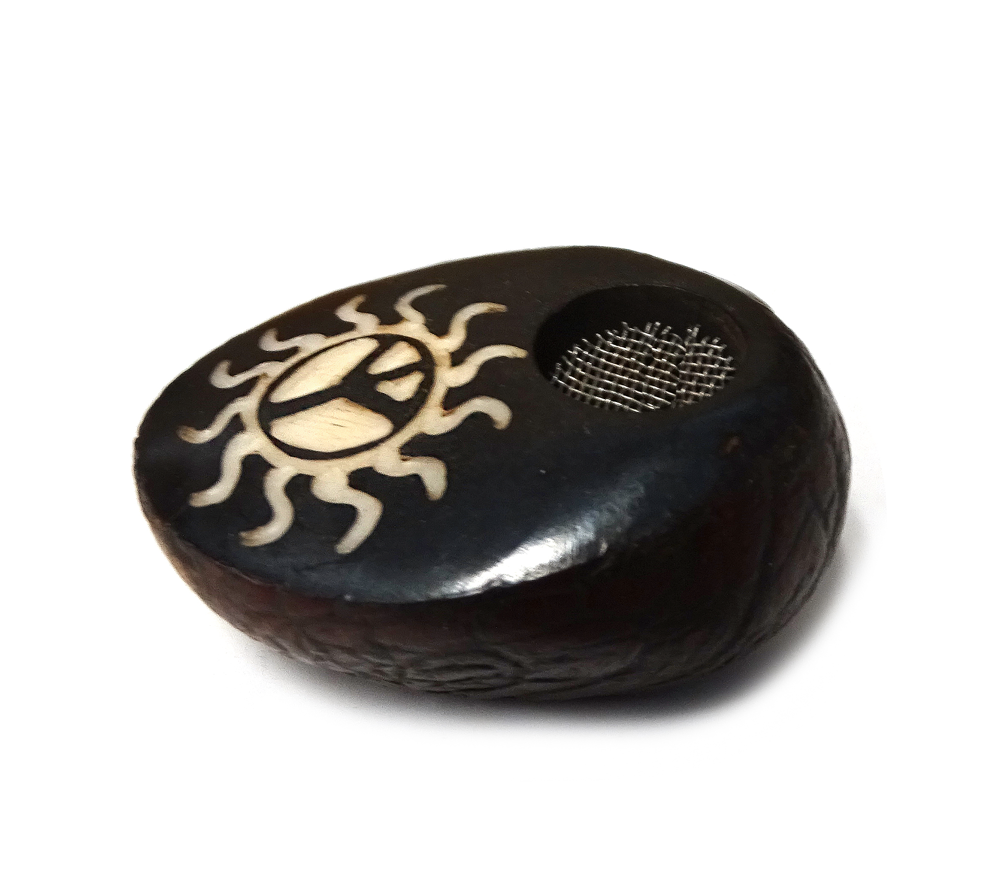 Handcarved tobacco smoking mini round natural tagua nut hand pipe bowl of a peace sign symbol inside of a tribal sun design.