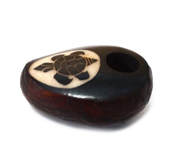 Handcarved tobacco smoking mini round natural tagua nut hand pipe bowl of a tribal sea turtle.