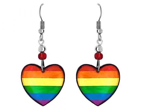 Handmade rainbow heart-shaped acrylic dangle earrings with beaded metal hooks in striped pattern.