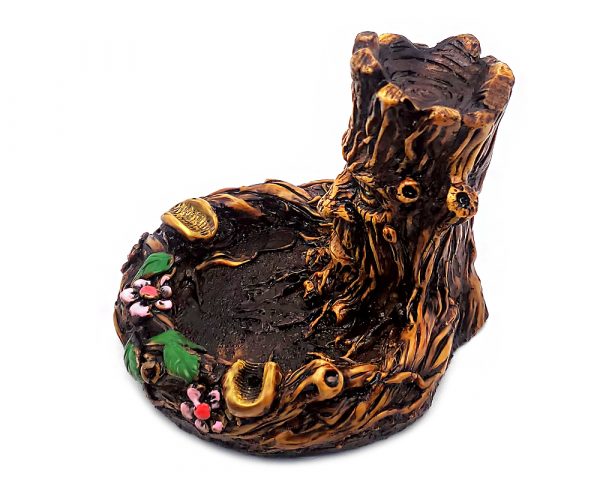 Handcrafted round incense holder ash tray with a floral design and a 3D figurine of a tree man in brown, black, gold, green, and multicolored color combination.