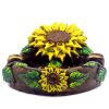 Handcrafted round incense holder ash tray with floral design and a 3D figurine of a sunflower with leaves in yellow, brown, black, gold, green, and multicolored color combination.